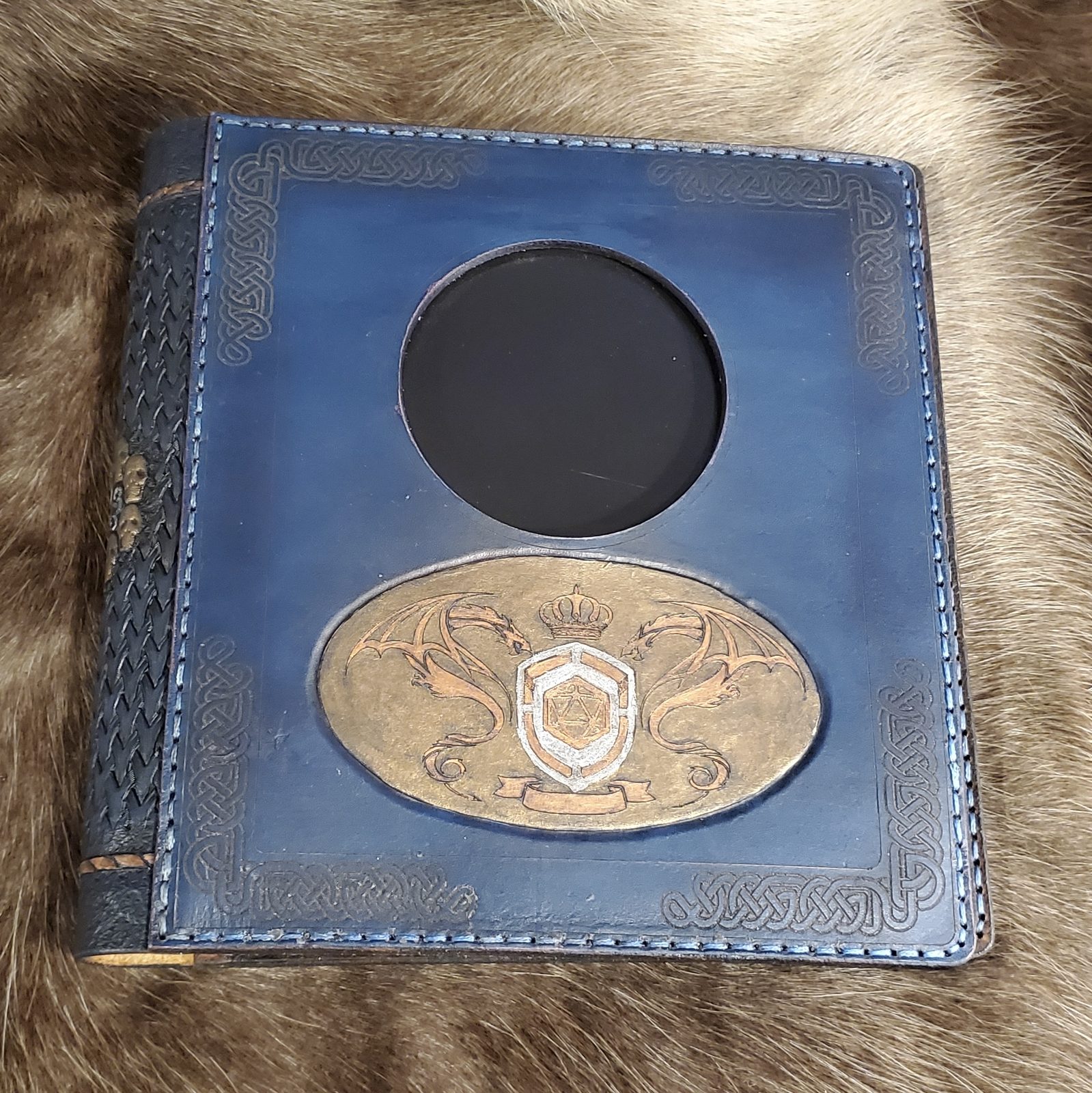 Tooled character book front