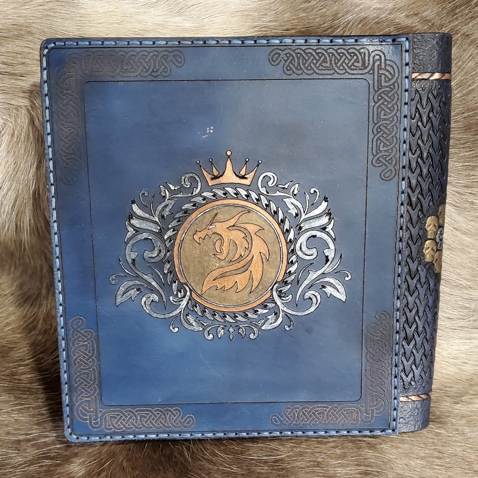 Tooled character book open