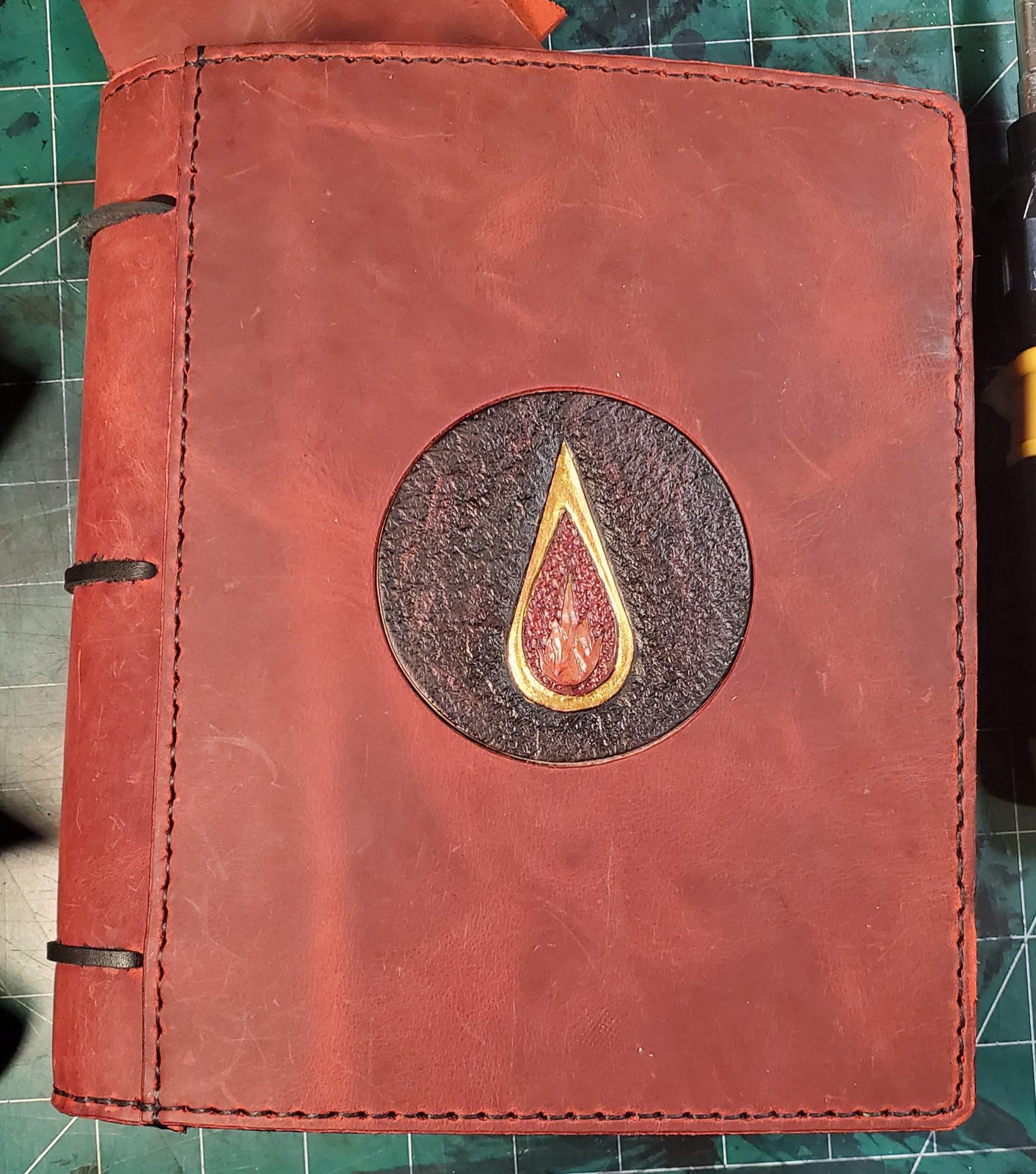 Character book front with a dragon medallion